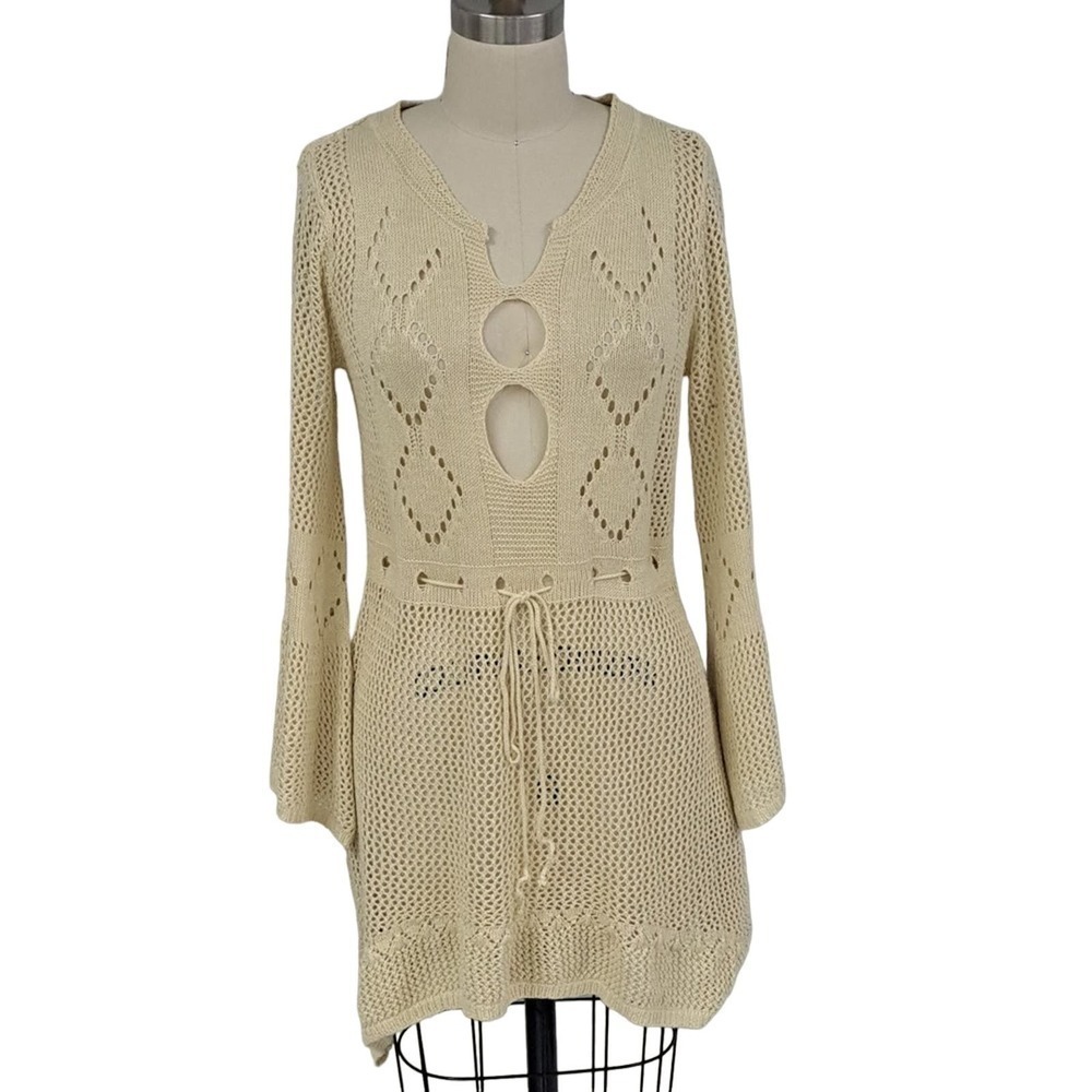 Knit swimsuit cover up 100% polyester cream color with draw string.